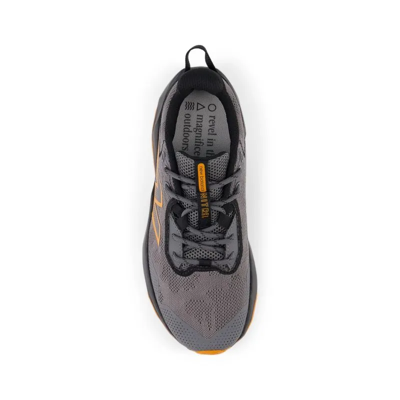 New Balance DynaSoft Nitrel v6 GS Kids Trail Shoes running on a track oval