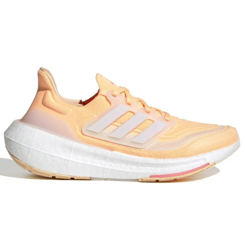 Adidas Ultraboost Light Womens Running Shoes running in a coastal area
